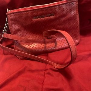 Small red leather Michael Kors crossbody purse